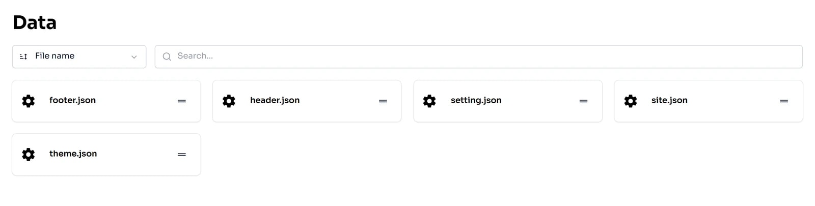 Màn hình Data liệt kê các tệp footer.json, header.json, setting.json, site.json, theme.json dạng thẻ, kèm thanh sắp xếp và tìm kiếm.